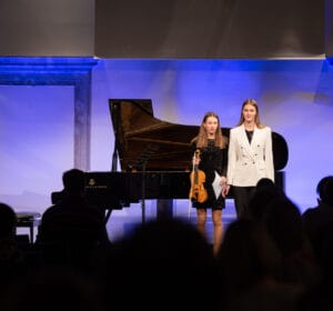 34/40 Violin and piano student on stage